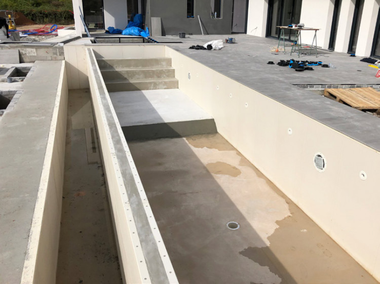 Construction d'une piscine à débordement Aquilus