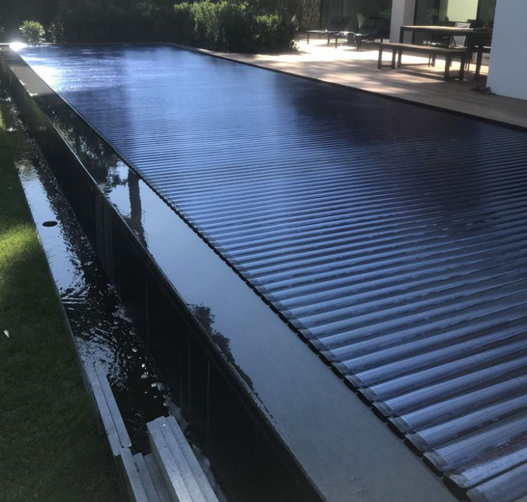 Made-to-measure pool cover with  polycarbonate slats Pool Cover Systems